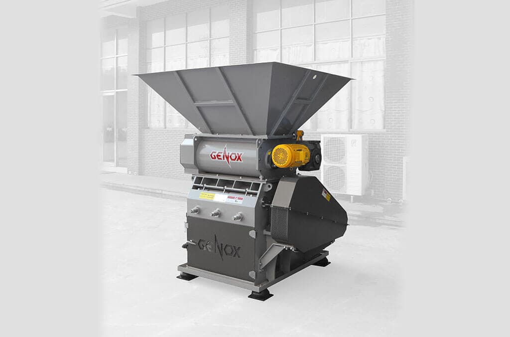 Manufacturer illustration of genox GC800T plastic granulator with a feed hopper, cutting body and guarded motor drive. Manufacturer product illustration.