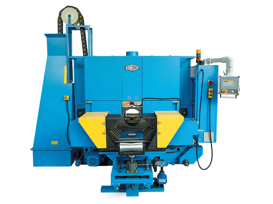 Blue industrial hose cutting machine with support table, guarded cutting area and control panel, photographed in a workshop. Reference equipment photograph.