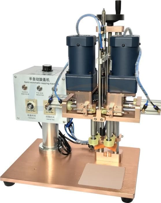 LIANHE semi-automatic screw capper with a benchtop frame, paired driven cap-contact rollers and control panel. Reference equipment photograph.