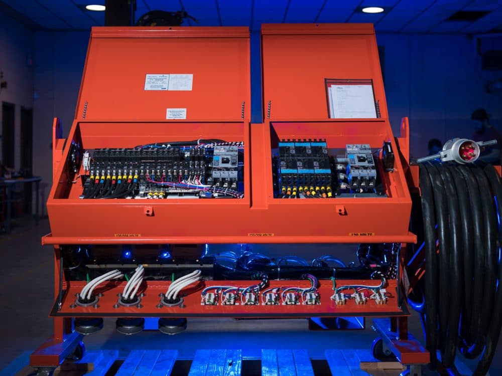 M. Davis portable distribution centre with open protective-circuit panels and cable connections. Reference equipment photograph.