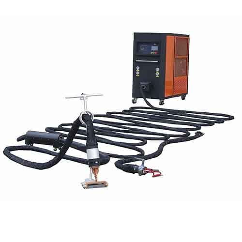 HLQ induction coating-removal power unit with hoses and handheld heating head. Reference equipment photograph.