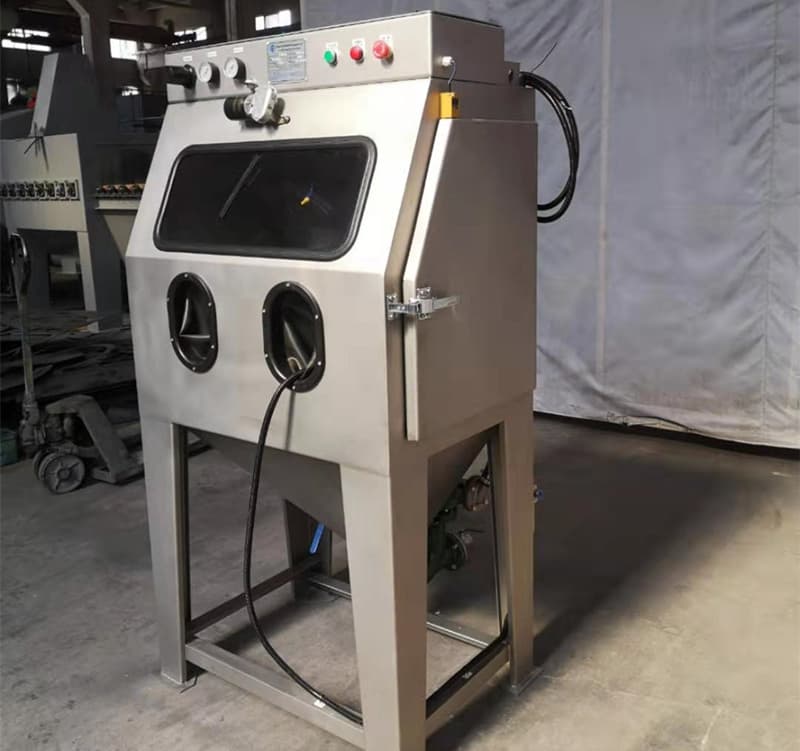 Taisheng wet blasting cabinet photographed in a workshop. Reference equipment photograph.