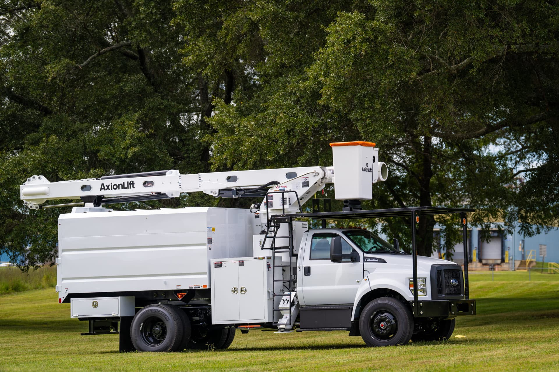 Axion TCO56 truck-mounted aerial lift photographed at an outdoor work area. Reference equipment photograph.