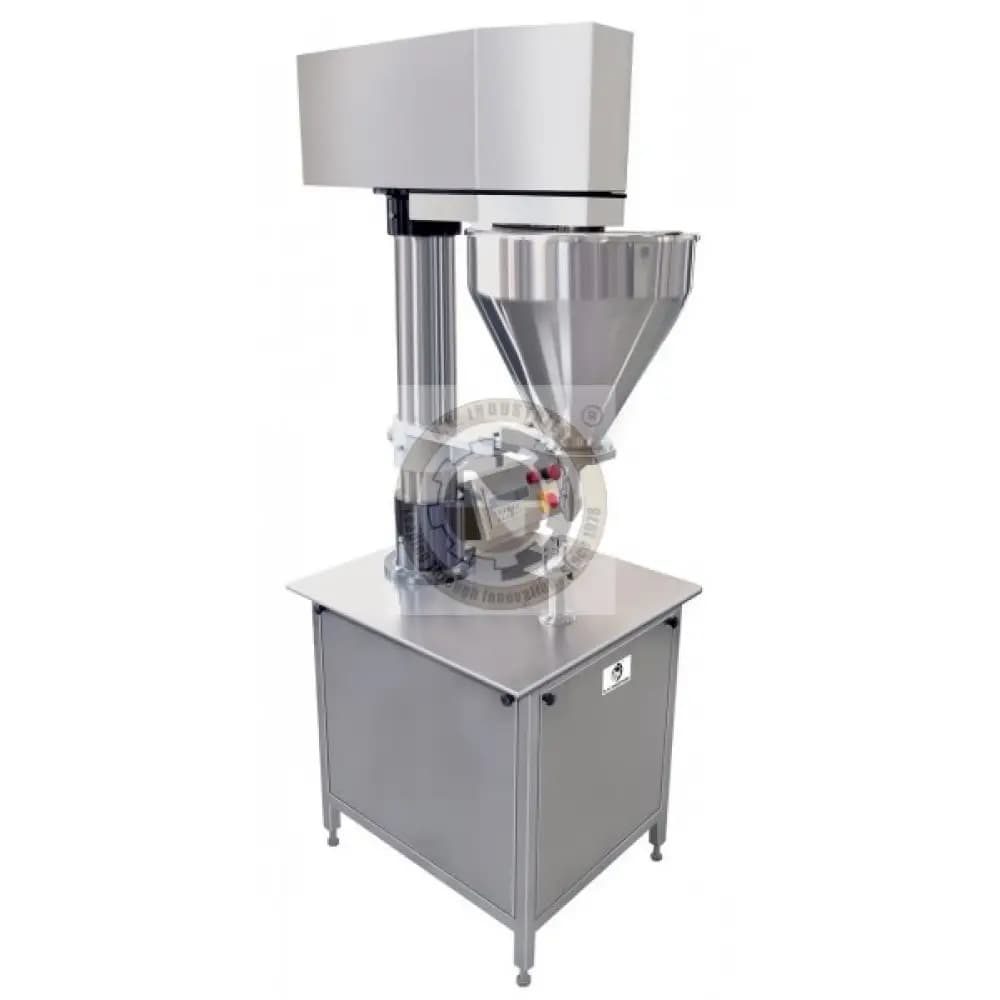 N.K. Industries semi-automatic auger filler showing its powder hopper, vertical drive and filling outlet. Reference equipment photograph.