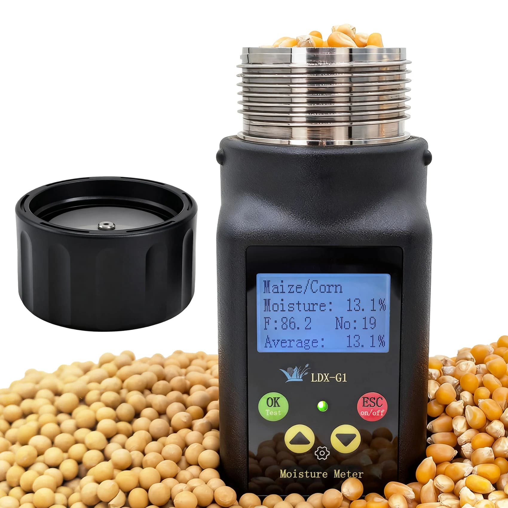 Handheld grain moisture meter with a sample chamber and LCD, shown with grain kernels. Reference equipment photograph.