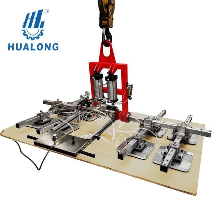 Hualong suspended vacuum frame with multiple pads and pneumatic tubing. Reference equipment photograph.