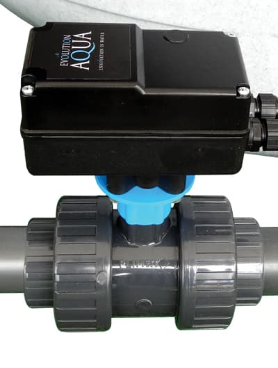 Evolution Aqua Nexus Automatic waste-valve component with its electric actuator and union-connected valve body, used in the compatible filter cleaning kit. Reference equipment photograph.