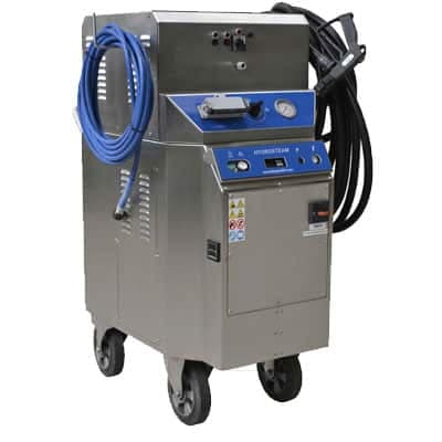 Stainless wheeled cleaning unit with control panels, pressure gauge, coiled blue hose and black cleaning hose on a white background. Reference equipment photograph.