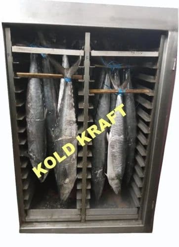 Stainless upright freezing cabinet with internal racks and hanging fish; original KOLD KRAFT watermark remains visible. Reference equipment photograph.