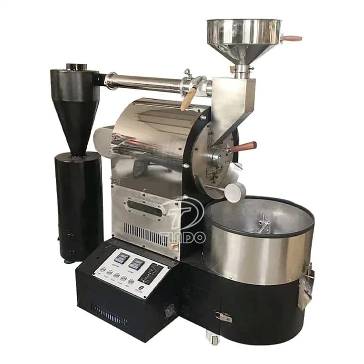 Tindo rotating-drum cocoa and coffee roaster with a cooling tray, exhaust cyclone and control panel. Reference equipment photograph.
