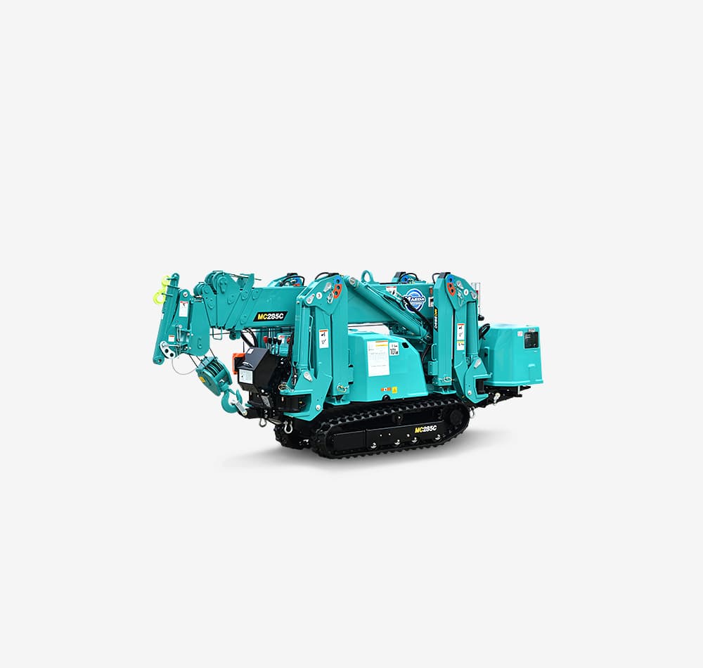 Maeda MC285C-3 tracked spider crane with folded boom and outriggers. Reference equipment photograph.