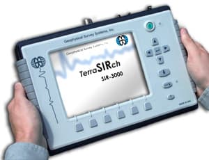 GSSI SIR-3000 survey control unit held in two hands. Reference equipment photograph.