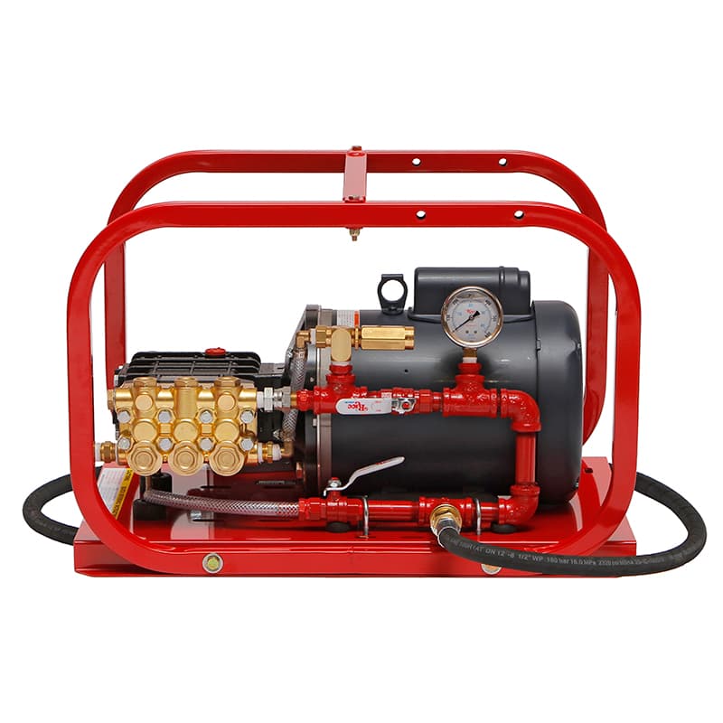 Red roll-cage hydrostatic test pump with motor, brass pump head, gauge and hose. Reference equipment photograph.