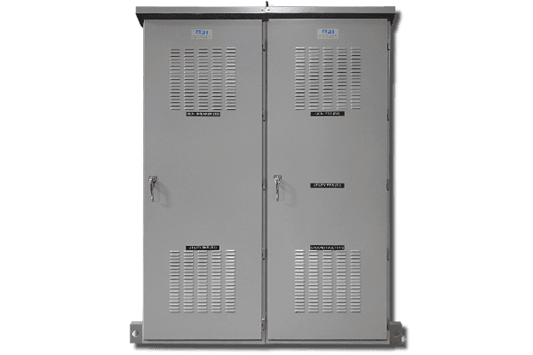 Real grey two-section APT MEA switchgear cabinet photograph on a transparent background, with louvres, door handles and APT labels. This is a cabinet-family example; the front exterior does not establish installed generator-paralleling controls. Reference equipment photograph.