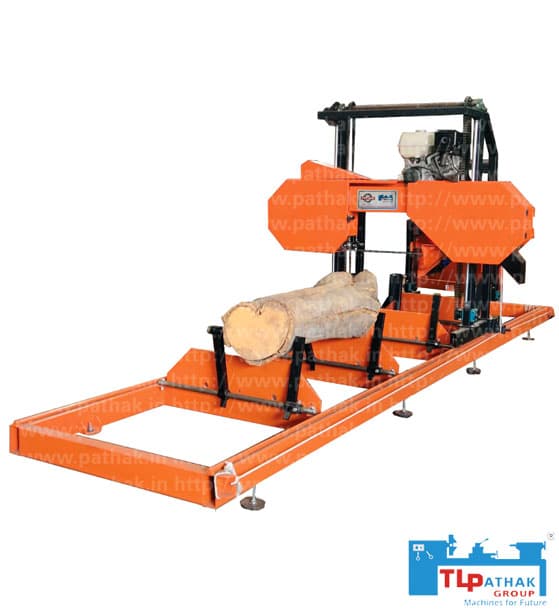T.L. Pathak portable bandsaw mill with a cutting head, log supports and rail bed. Reference equipment photograph.