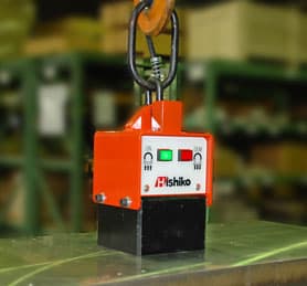 Hishiko ALT electro-permanent magnet suspended above a steel plate. Reference equipment photograph.