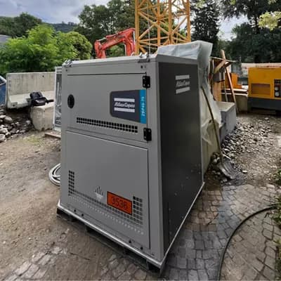 Atlas Copco ZBP mobile battery canopy operating at a construction site. Reference equipment photograph.