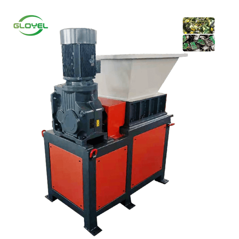 Manufacturer illustration of gloyel twin-shaft recycling shredder with a feed hopper, cutting chamber and drive. Manufacturer product illustration.