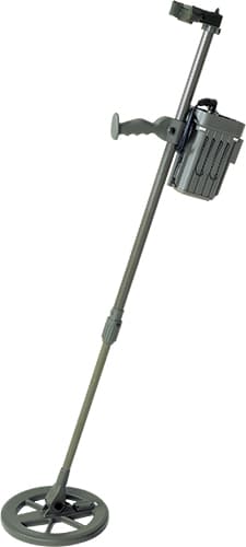 Green telescopic detector with a circular search coil and attached electronics. Reference equipment photograph.