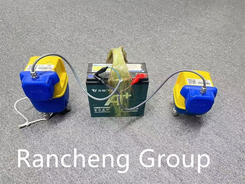 Three field seismic node instruments photographed on a rough floor. Reference equipment photograph.