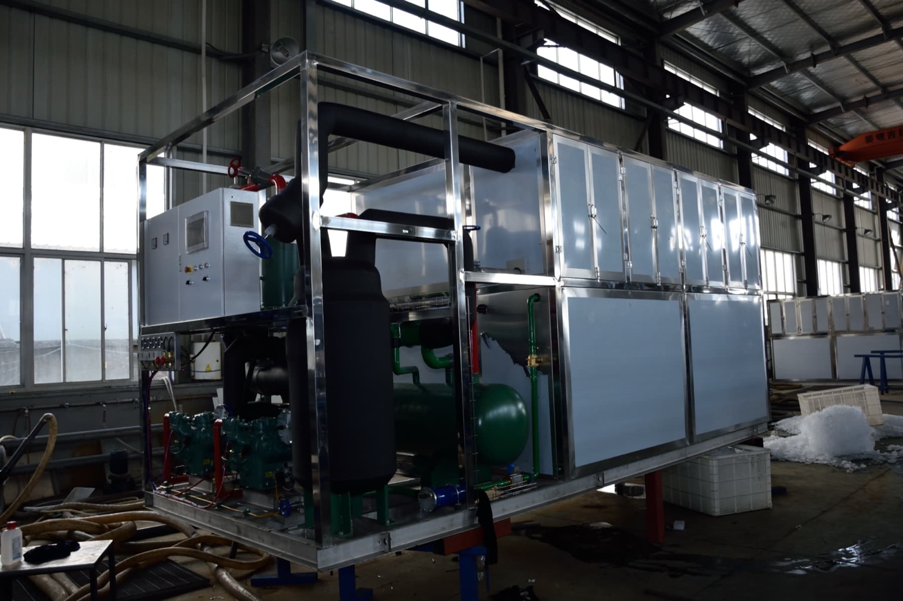 AP plate ice machine installation in a factory testing area. Reference equipment photograph.