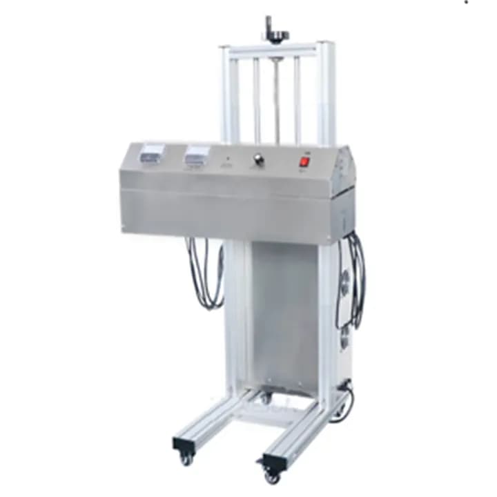 Lancing induction sealer with an adjustable overhead induction head on a floor stand. Reference equipment photograph.