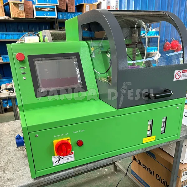 Green tabletop-style injector bench reference with protective cover and screen